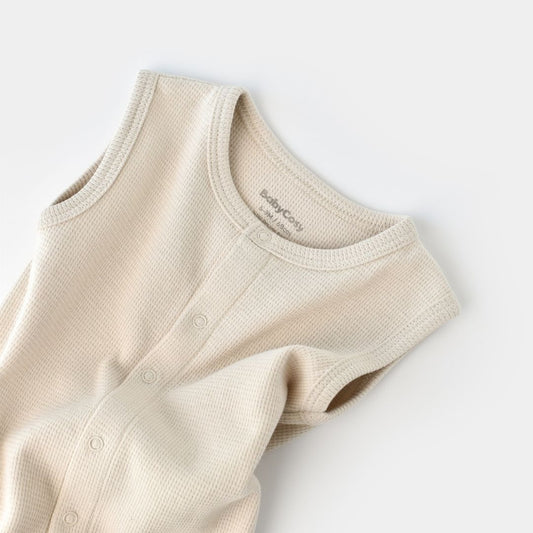WAFFLE Short sleeveless onesie in 100% Organic Cotton