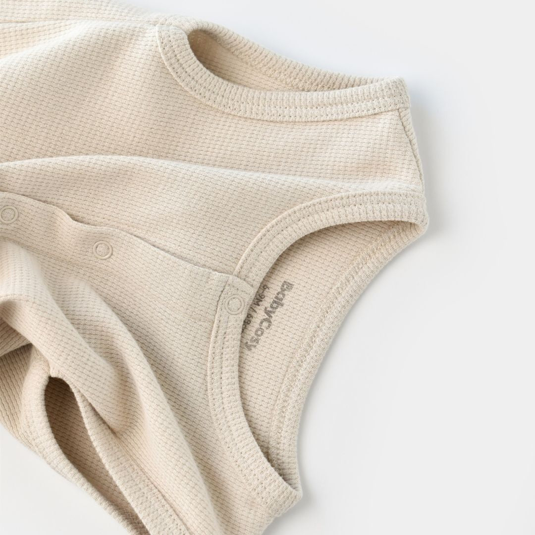 WAFFLE Short sleeveless onesie in 100% Organic Cotton