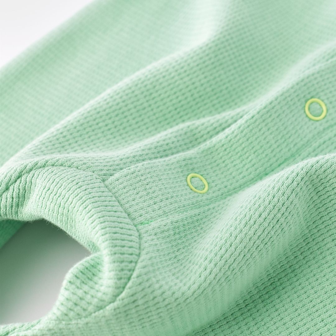 WAFFLE Short sleeveless onesie in 100% Organic Cotton