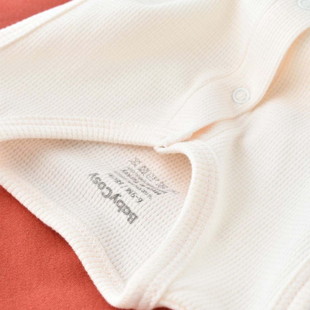 WAFFLE Short sleeveless onesie in 100% Organic Cotton