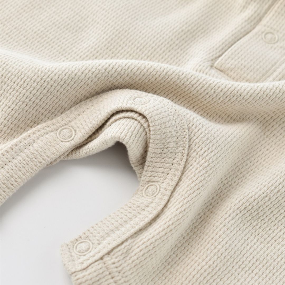 WAFFLE Short-sleeved romper in 100% Organic Cotton