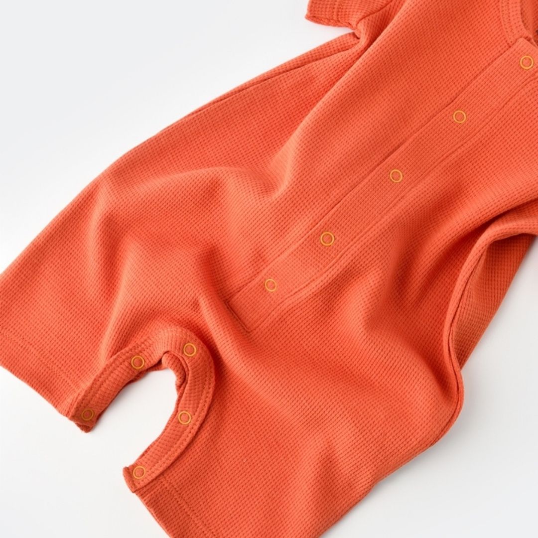 WAFFLE Short-sleeved romper in 100% Organic Cotton