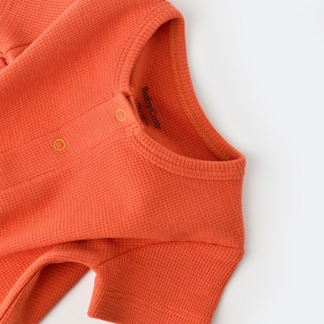 WAFFLE Short-sleeved romper in 100% Organic Cotton